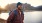 guy smiling by lake